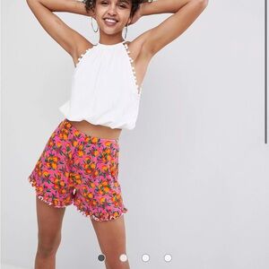 ASOS petite frill hem shorts in orange print